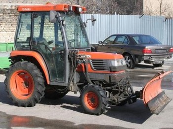 Kubota ST30 with brush and blade - Farm tractor